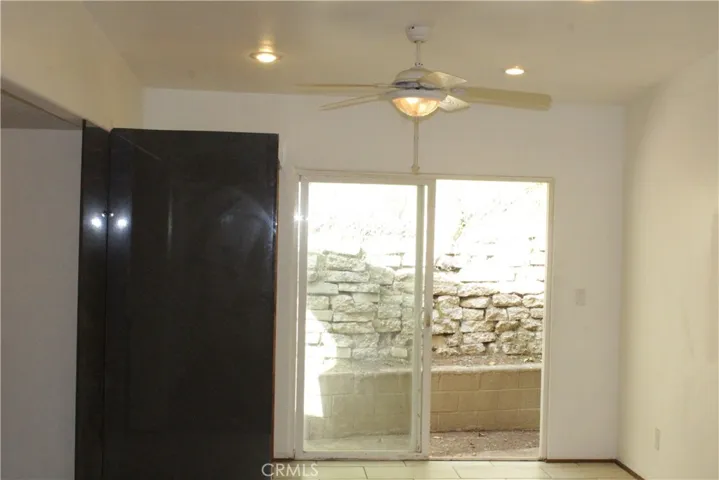 Dinning room with ceiling fan and recess lights