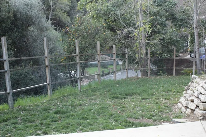 Back yard looking out from the 3rd bedroom