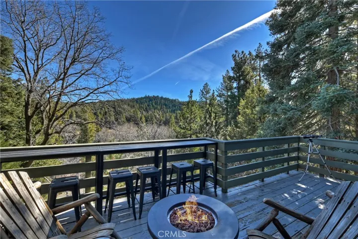 Enjoy the Fresh Mountain Air on the Lovely Deck Amongst the Trees!!