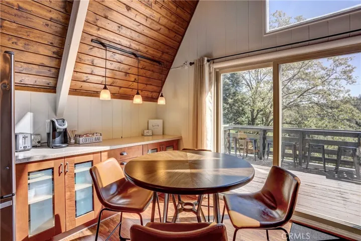 Dining Area Has Amazing Coffee Bar & Extra Cabinets for Storage.