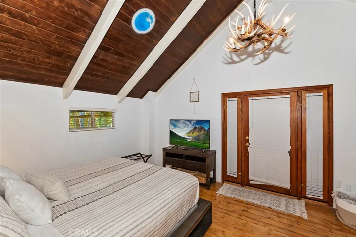 Bedroom 3 Upstairs with Access to Garage.  Love those Ceilings!