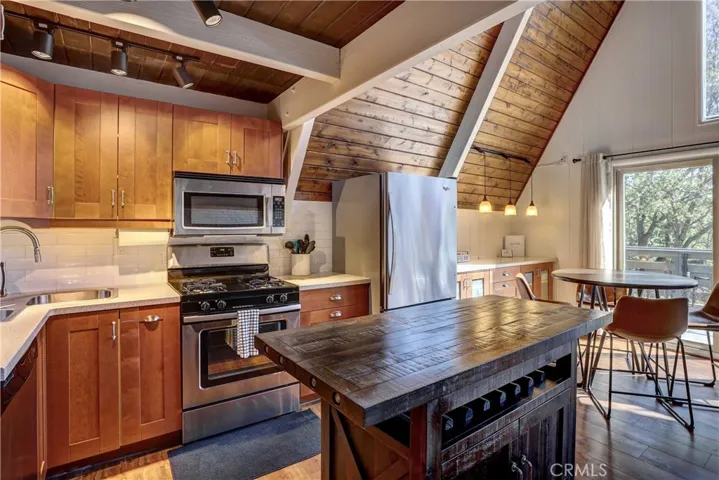 Very Nice Custom Cabinetry & Newer Appliances.