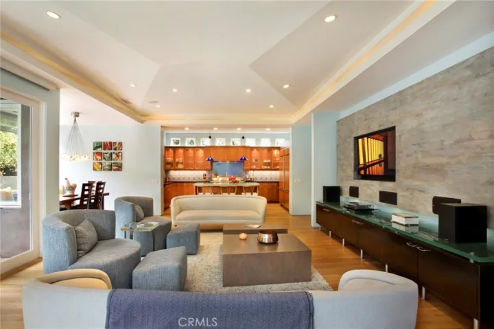 Family room boasts a ceiling with amazing lines.