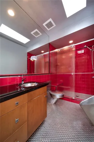 Modern, industrial design bathroom adjacent to bedroom 4.