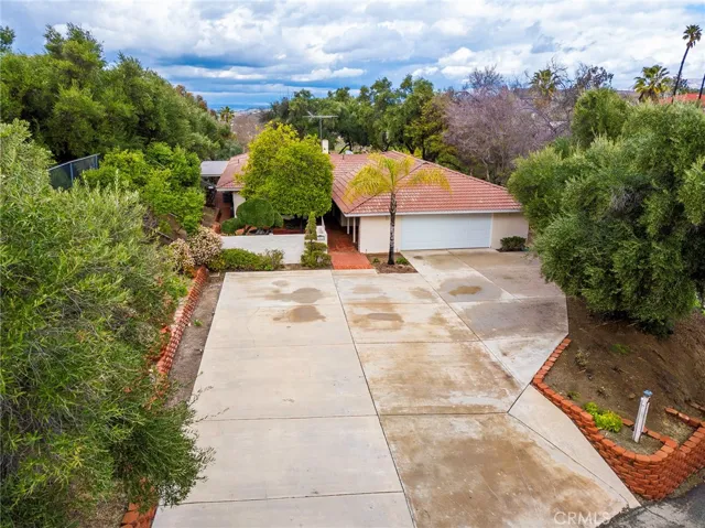 Tucked away and private. Large cement parking area
