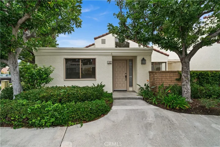 Front of home on corner lot next to Pool & Spa