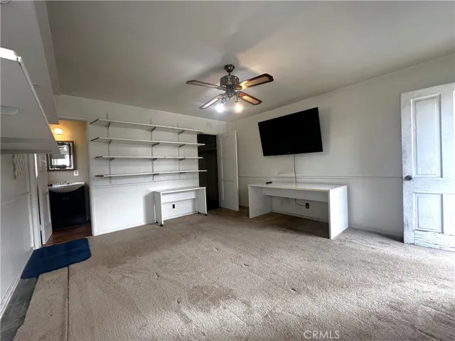 Unpermitted one bedroom attached to the garage.