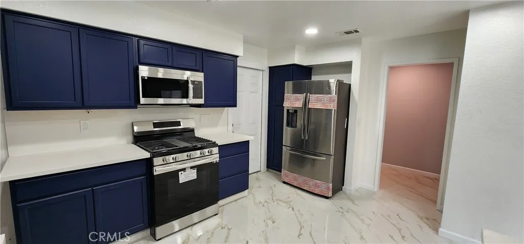 New Stainless steel refrigerator, oven range and microwave