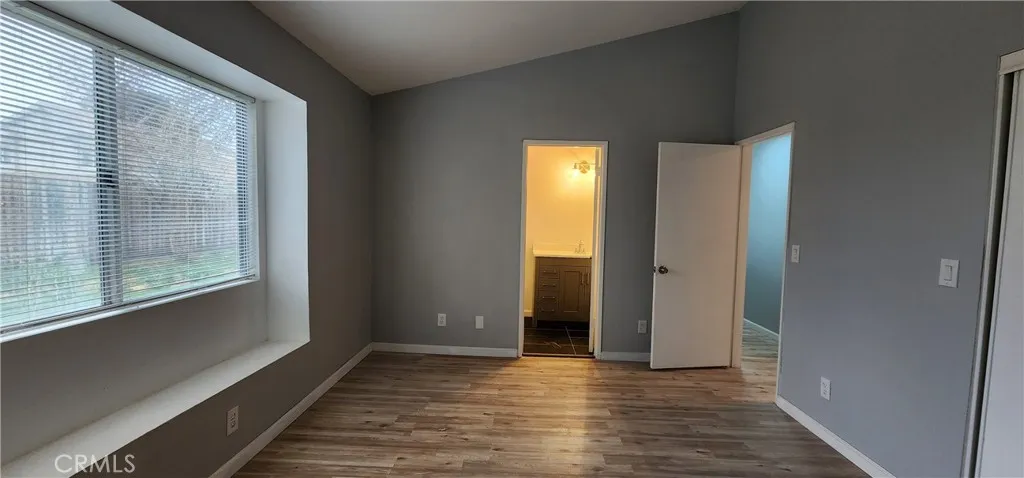 Master suite with high ceiling