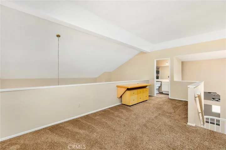 Loft looking towards full bathroom with shower - tub combo