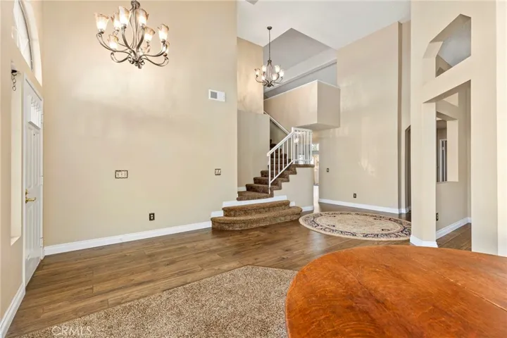 Staircase to loft and 3rd full bathroom