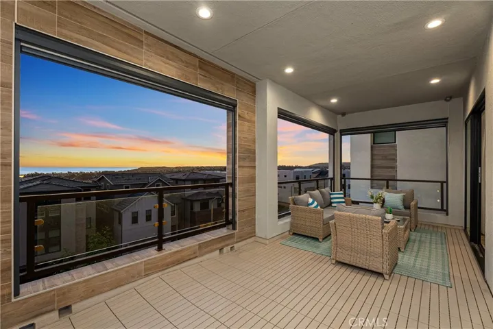 Large balcony in second floor with automatic 3 sun shades