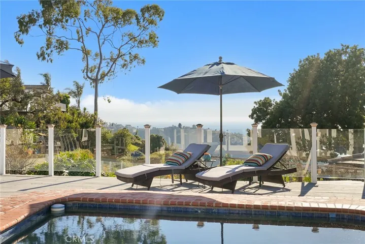 Ocean View Pool and Lounge Chairs with Umbrella