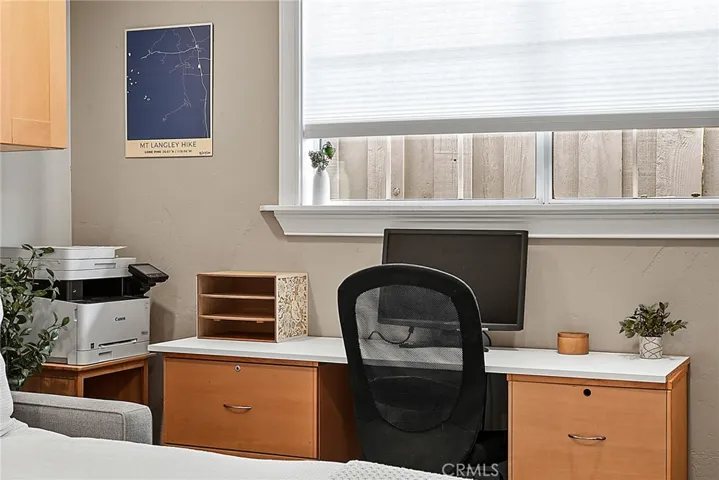Office/Guest Bedroom with foam mattress pull out couch, desk and printer