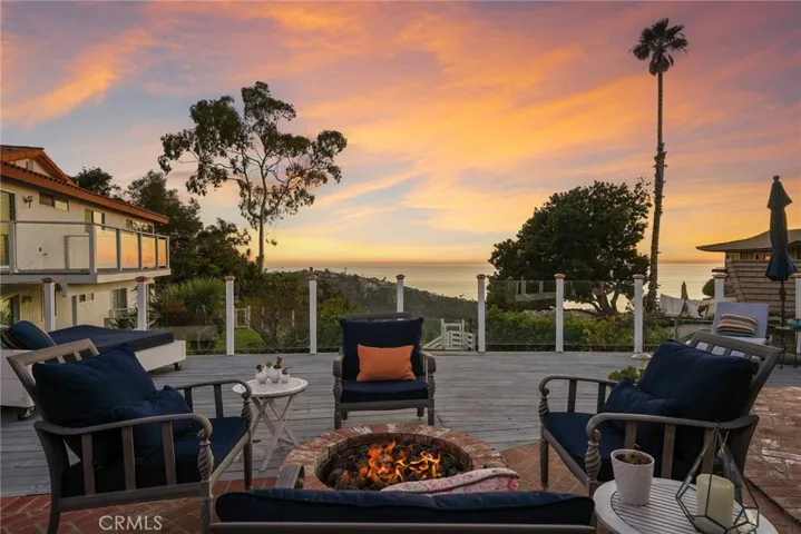 Ocean view fire pit with sunset