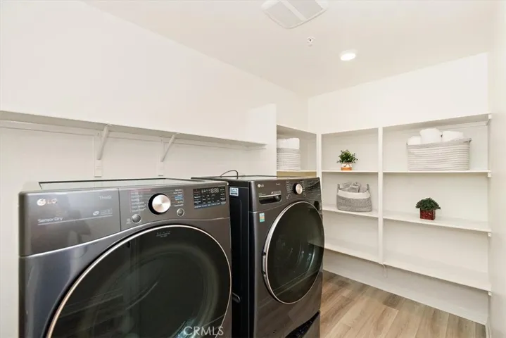 Laundry room with storage