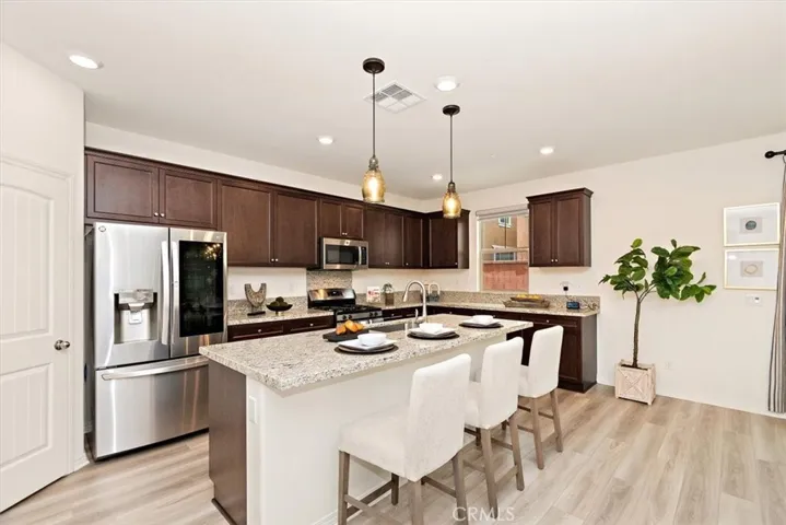 Kitchen island with walk in pantry