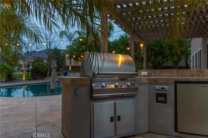 Barbecue island and it includes a refrigerator!