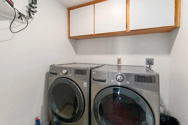 Laundry room includes washer and dryer
