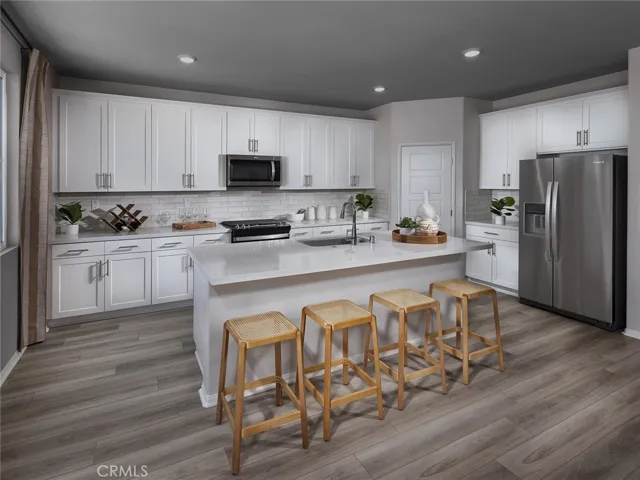 Photo is not of the actual home, but is an inspirational photo of builder’s model home and may depict options, furnishings, and/or decorator features that are not included
