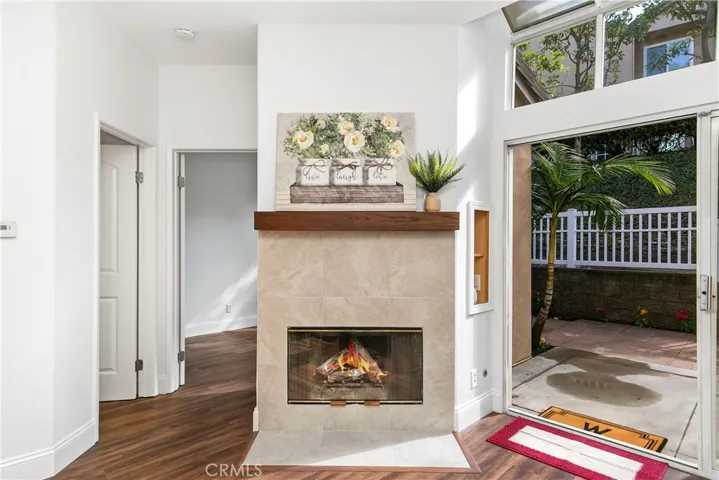 Custom Fireplace with Italian Tile and Red Oak Wood Mantel