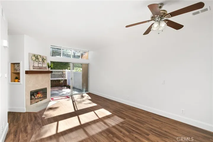 Open Bright Floorplan with New Luxury Vinyl Plank Flooring and Fireplace!