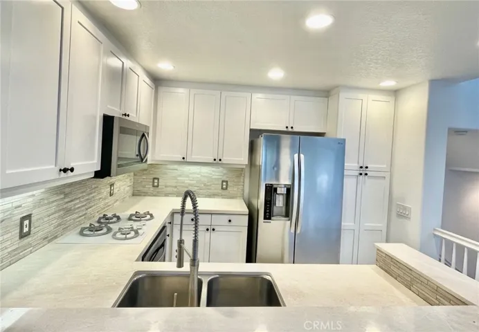 Upgraded kitchen with marble counters