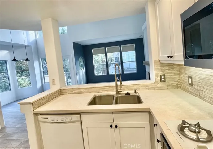 upgraded kitchen overlooking livingroom