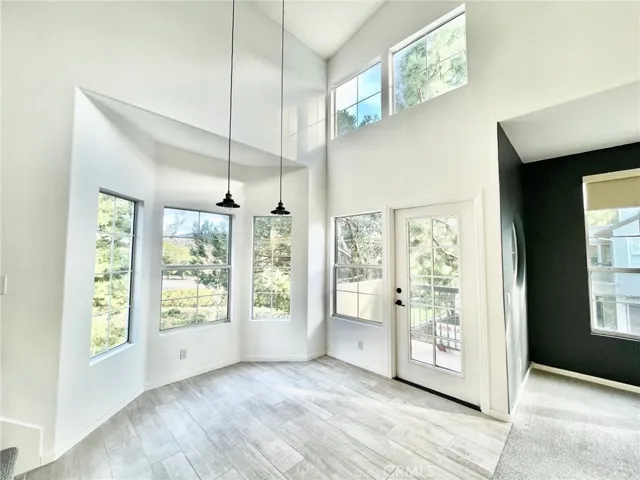 Dining room area with cathedral ceilings