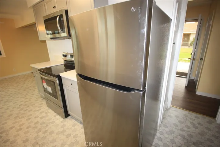 new SS refrigerator LG   in 41573, new flooring throughout both units...41573 and 41583