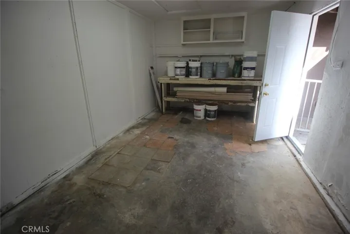 other end of first garage....workbench, with entry door.