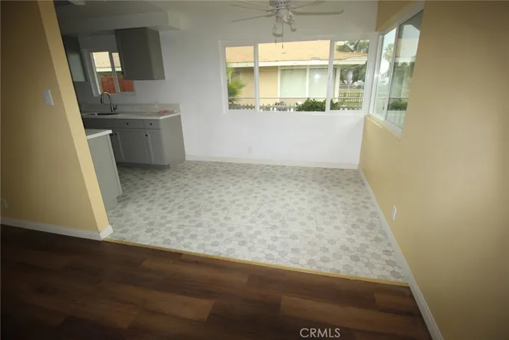 dining area off kitchen....great outside visibility (large windows) new ceiling fans