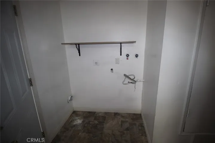inside laundry area off kitchen washer/dryer hookups  41583