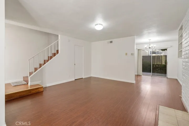 Upon entering, you'll find a spacious living room