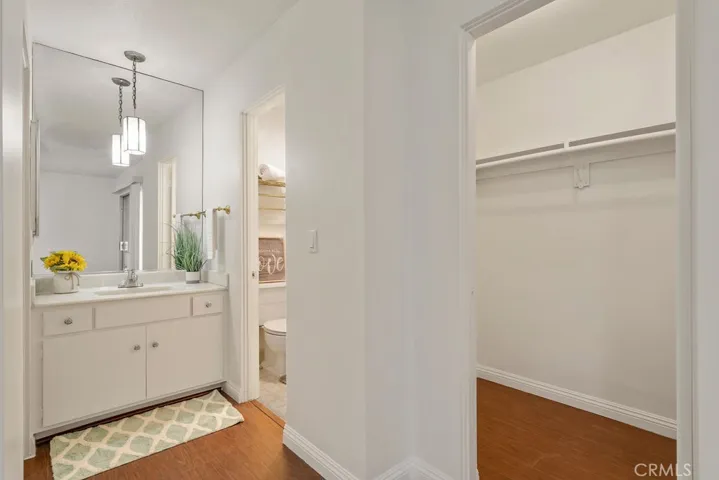 Primary bathroom with** two walk in closets**