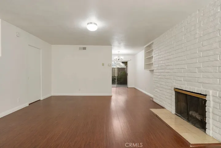 Living room adorned with a cozy fireplace