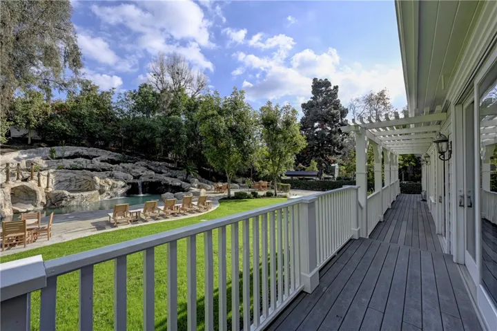 Your view outside the kitchen nook on the deck looking toward the pool, a very relaxing view!