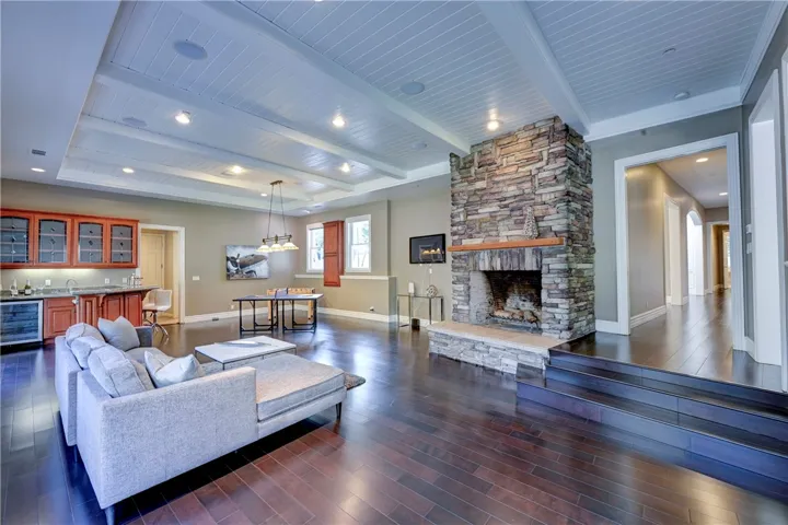 Stunning stack stone fireplace in huge family/game room.