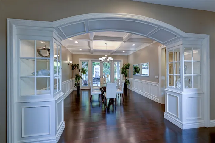 Entrance to expansive formal dining room which comfortably seats 12.