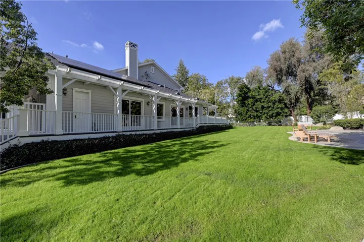 Note the white door which is easy access for guests to a refrigerator, for snacks, an extra dryer to dry wet suits and a full bath to shower off after being in the pool!