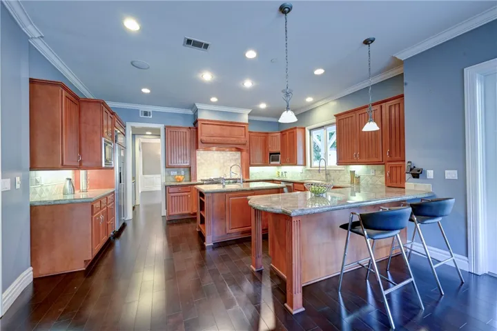 Breakfast bar seating in this expansive kitchen.