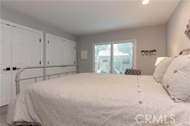 Spacious primary bedroom with incredible built-in closets