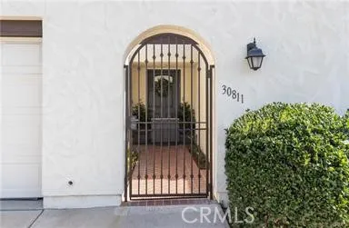 Gated entrance into courtyard