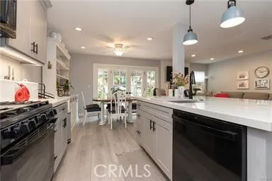 Kitchen looking toward eating area showing with upgraded appliances