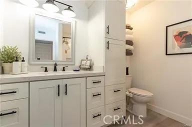 Hall bathroom totally remodeled with plenty of custom cabinets and plenty of lighting