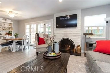 Living area with gas fireplace and flat screen TV
