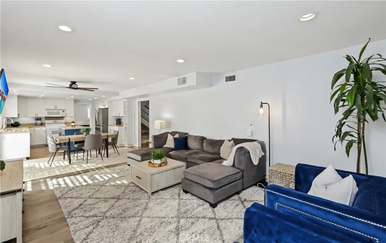 Extended family room is open to the kitchen.