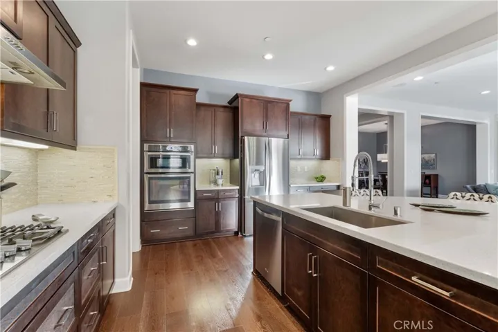 Spacious kitchen opens up to living/dining and family.