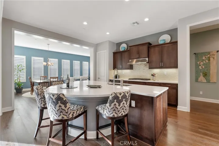 Spacious kitchen opens up to living/dining and family.
