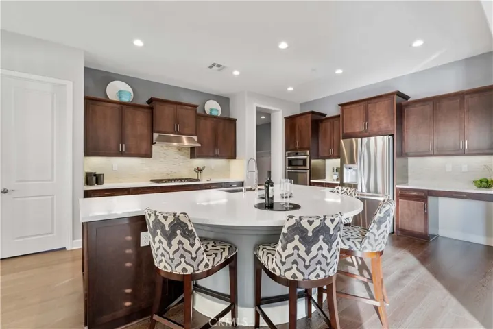 Spacious kitchen opens up to living/dining and family.